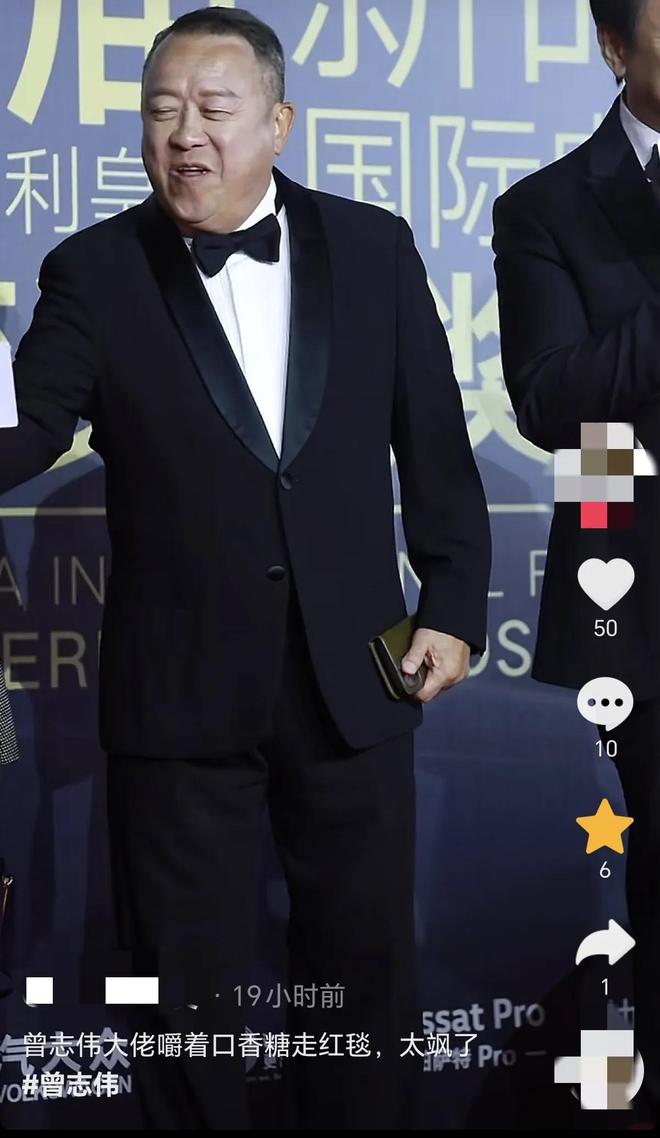 嚼口香糖与金沙总裁骑旋转木马挺幼稚凯发平台曾志伟澳门参加电影节台上(图9)